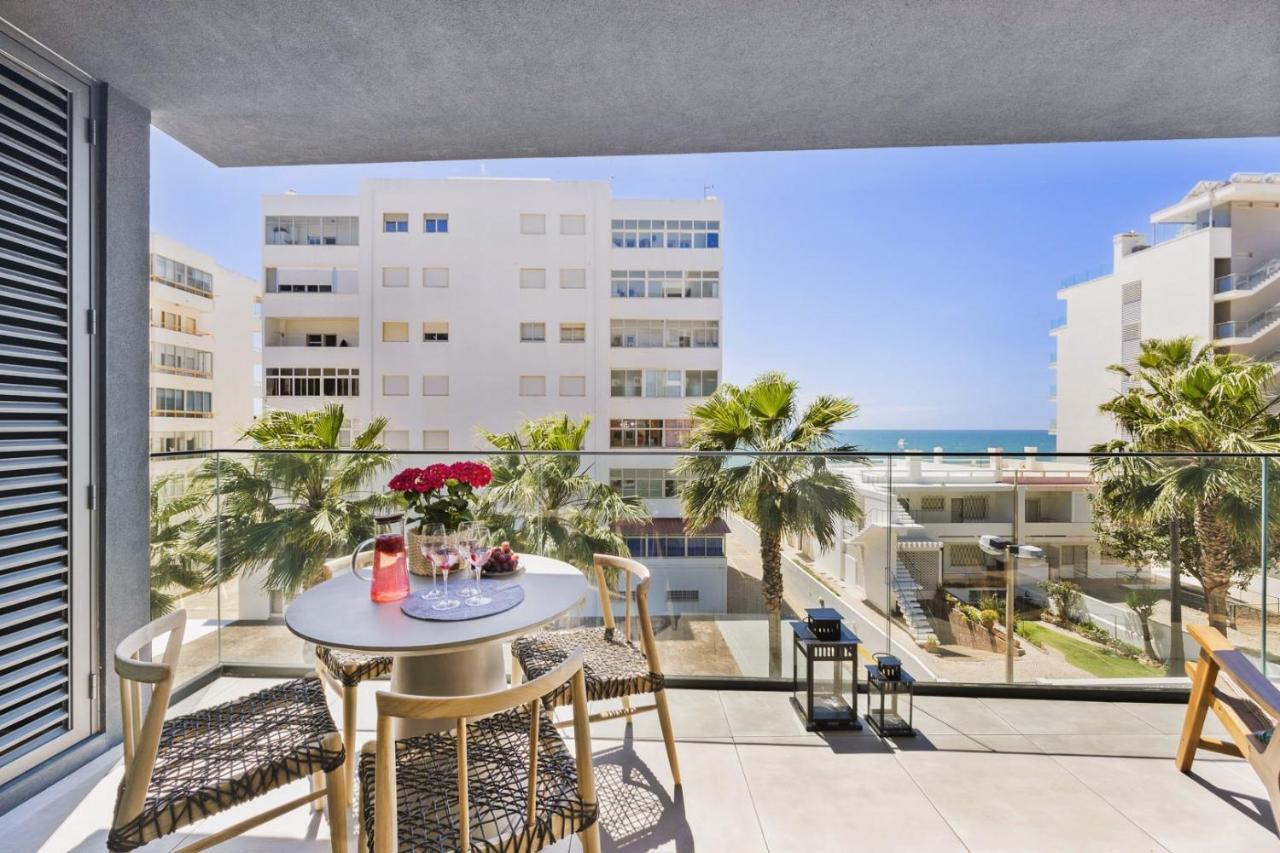 Stylish Modern Beachside Apartment With Pool & Seaview Quarteira Buitenkant foto